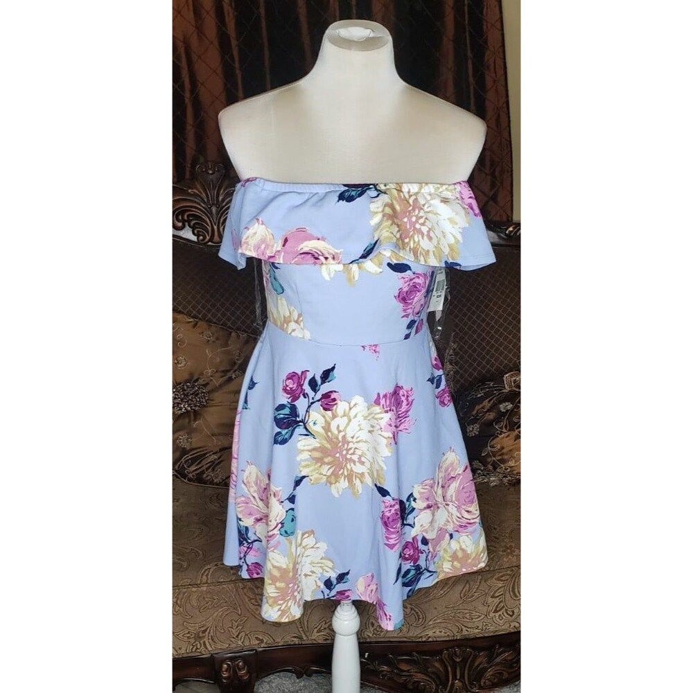 Xtraordinary dress, new with tags, size medium